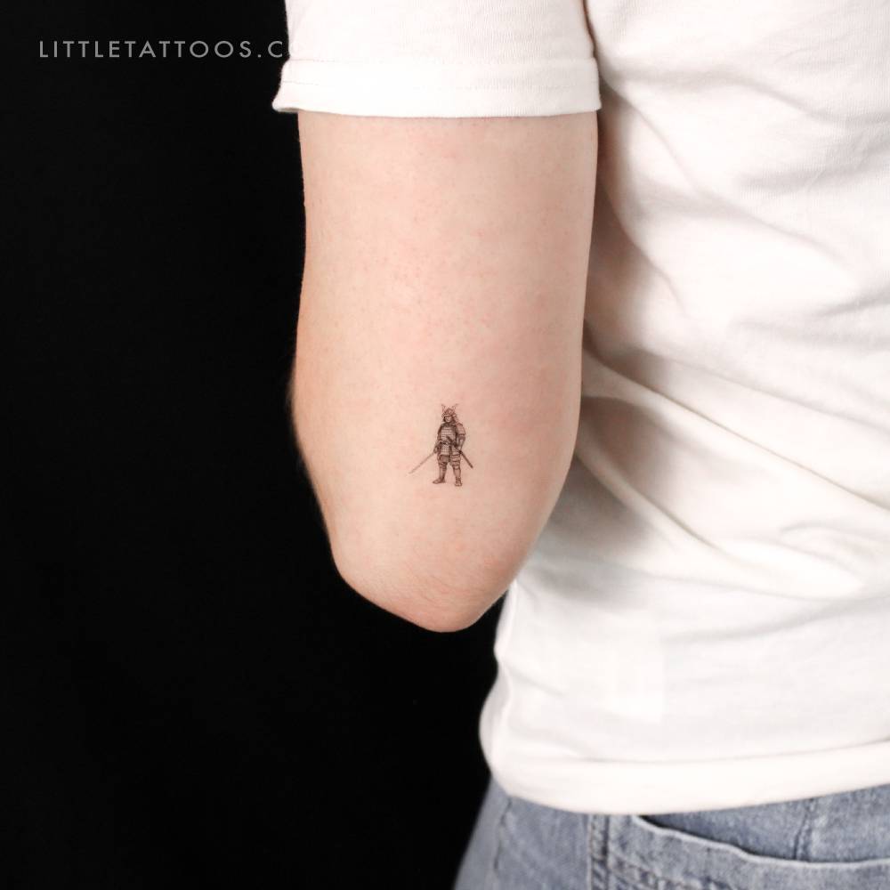 Micro-realistic style samurai temporary tattoo located on the tricep.