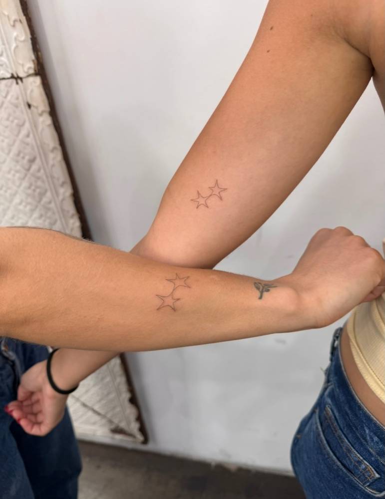 Matching minimalistic stars tattoo for best friends.