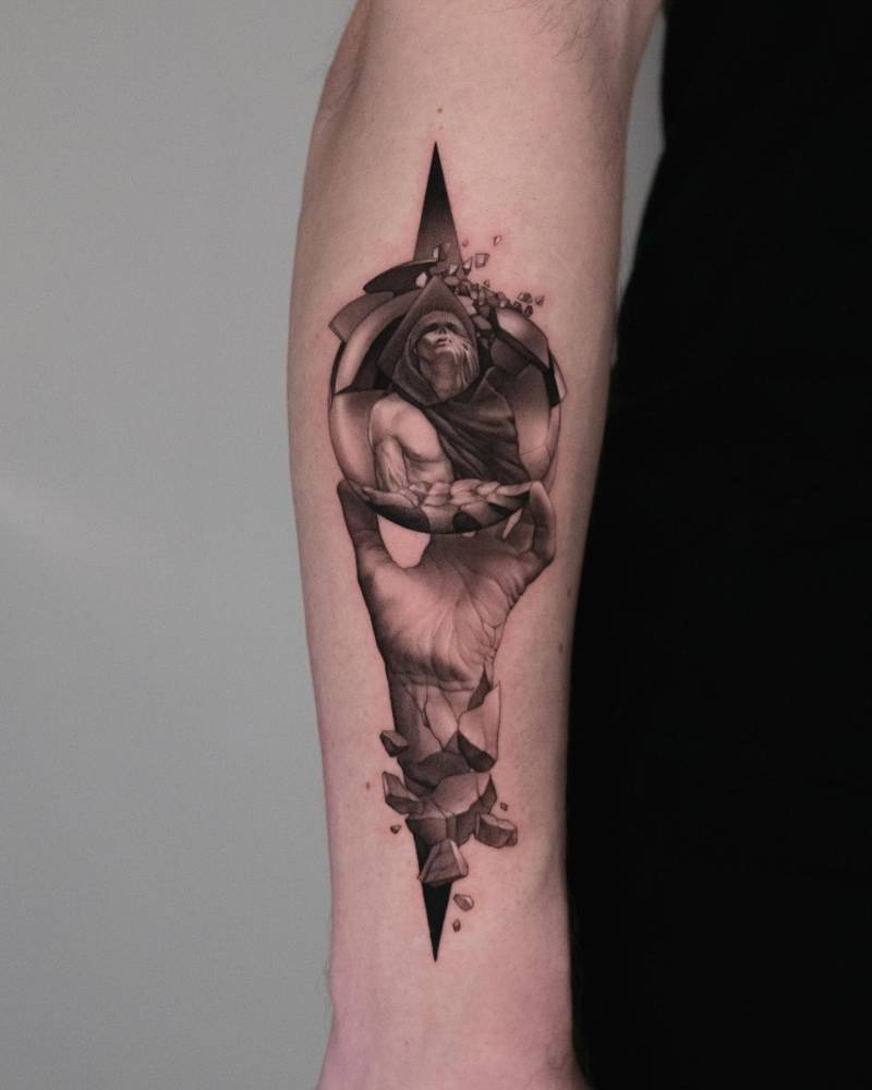 Crystal ball tattoo in micro-realism located on the forearm.