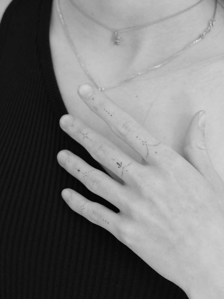 Single needle finger composition tattoos.
