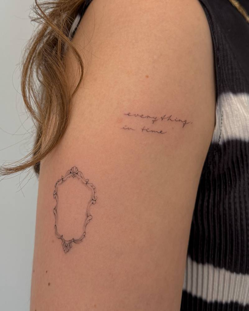 "Everything in time" lettering tattoo in handwritten font.