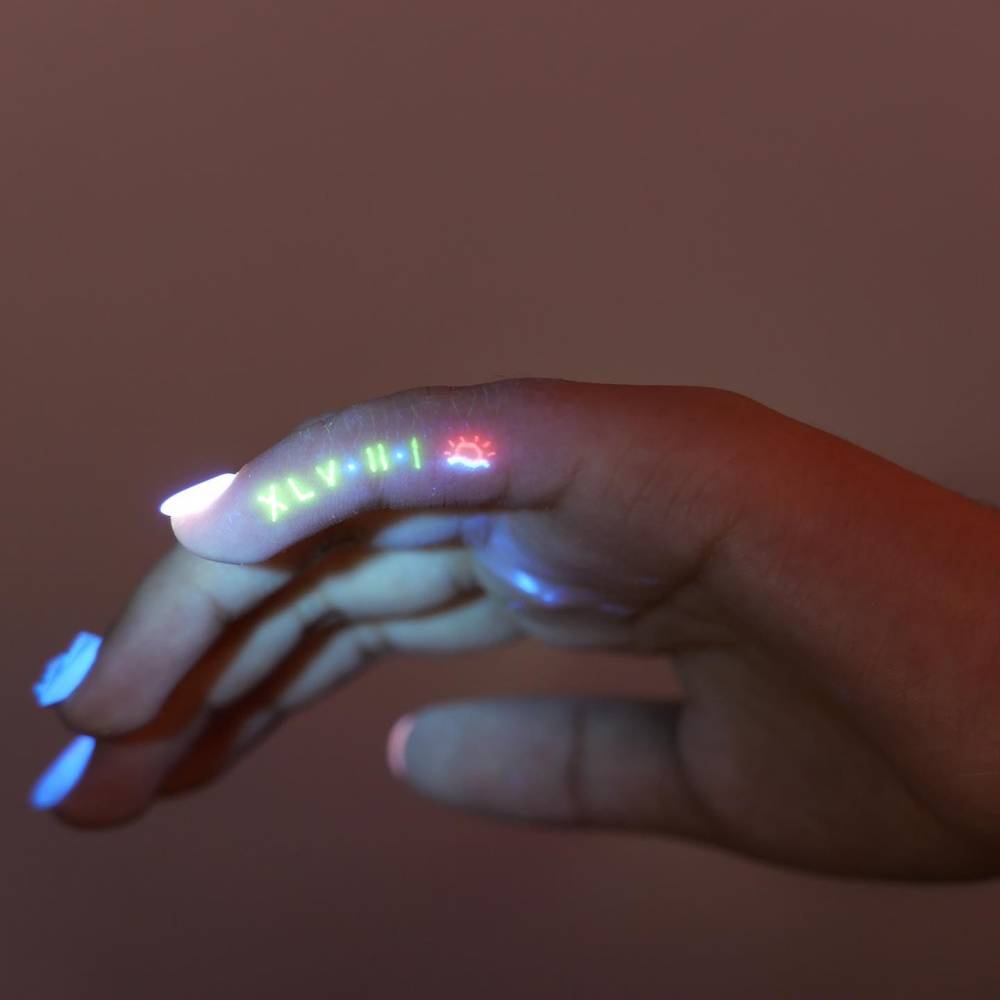 Roman numerals and sunset tattoo located on the finger.
