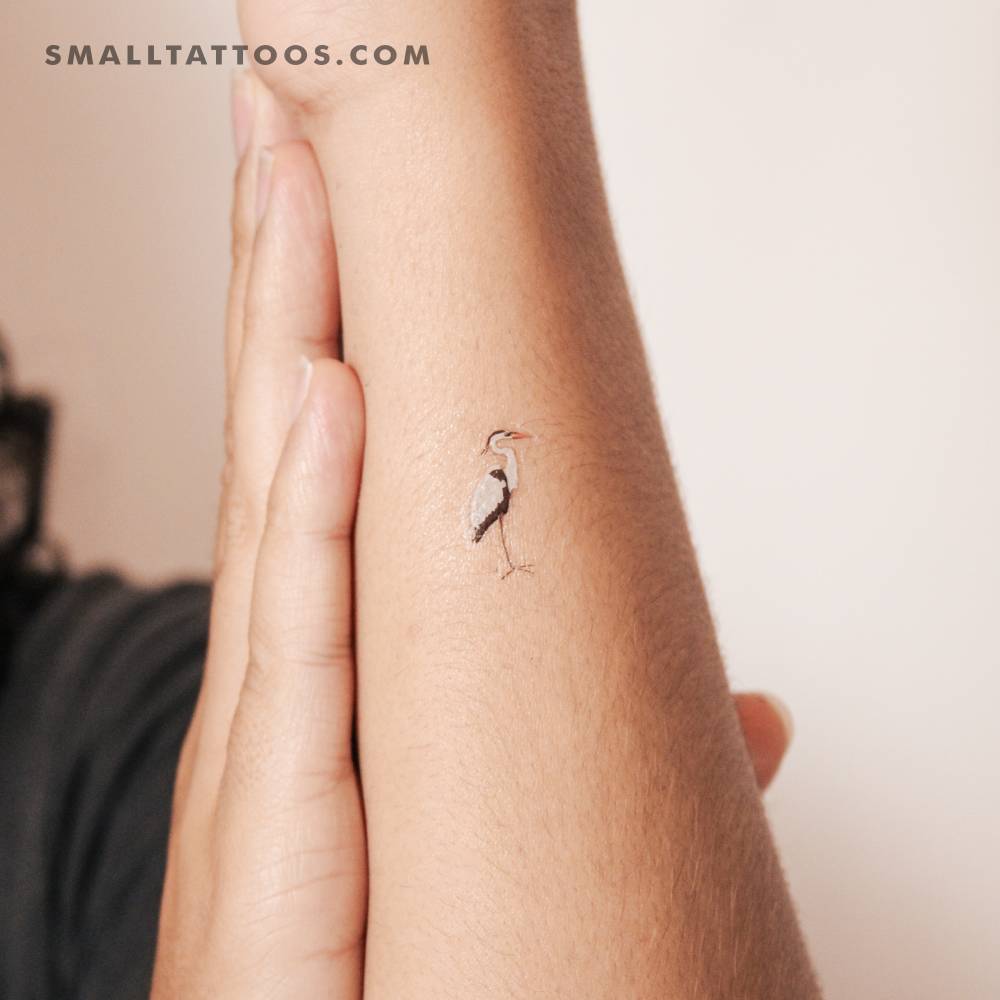 Illustrative style heron temporary tattoo placed on the wrist.