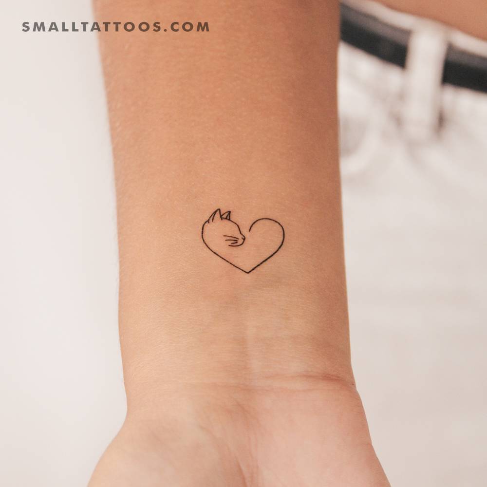 Cat lover heart temporary tattoo located on the wrist.
