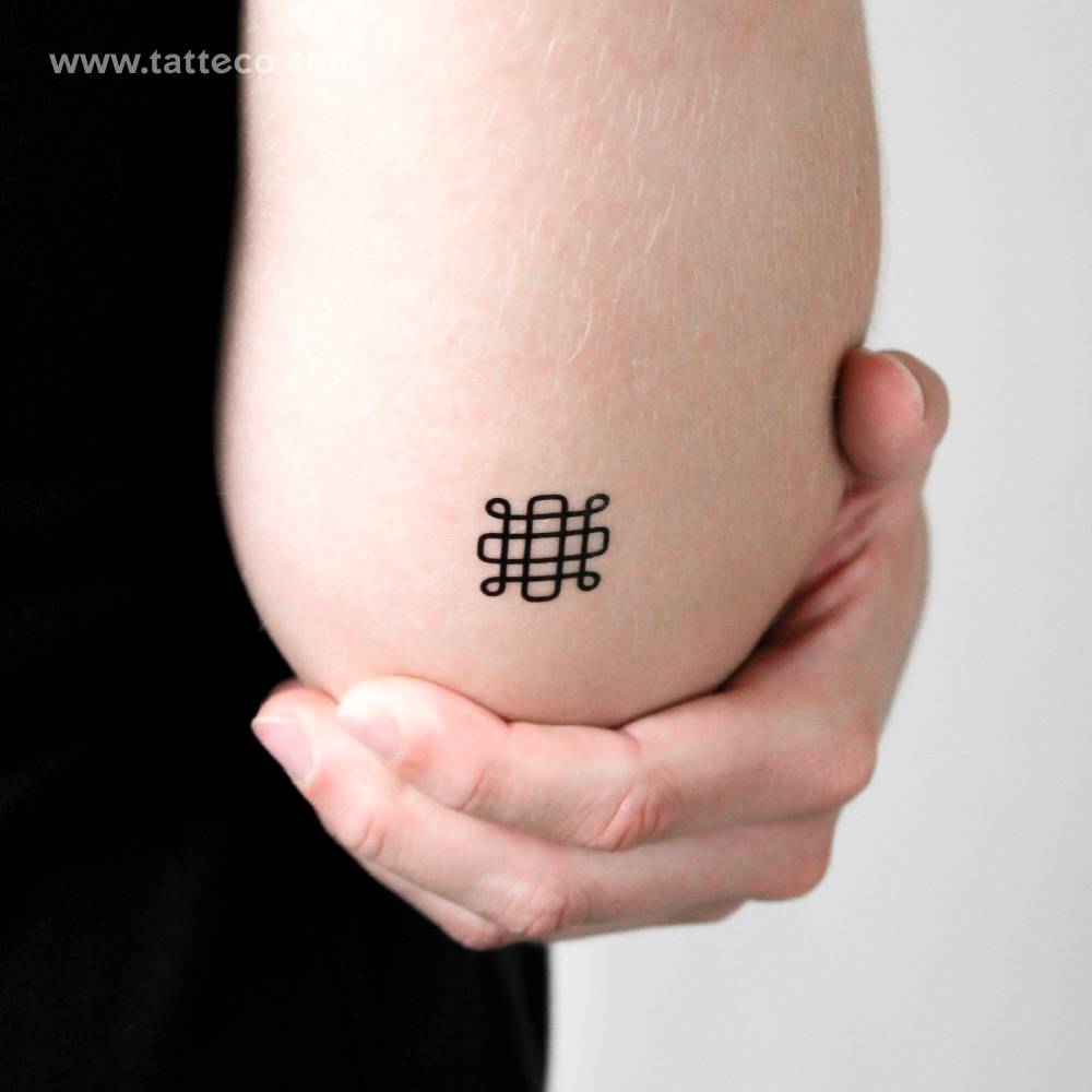 Samhain symbol temporary tattoo located on the tricep.