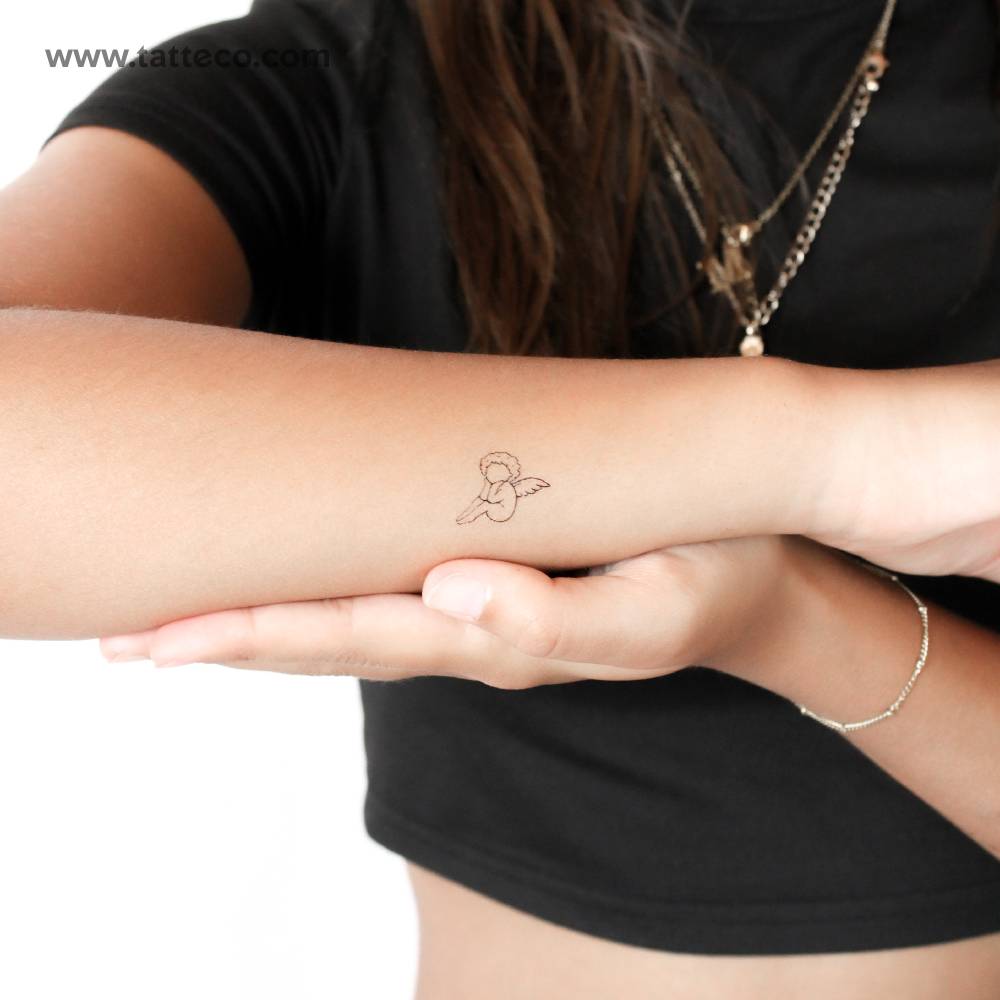 Tiny faceless cherub temporary tattoo.