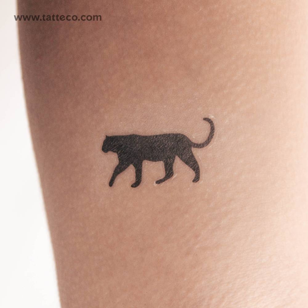 Black panther temporary tattoo located on the inner forearm.