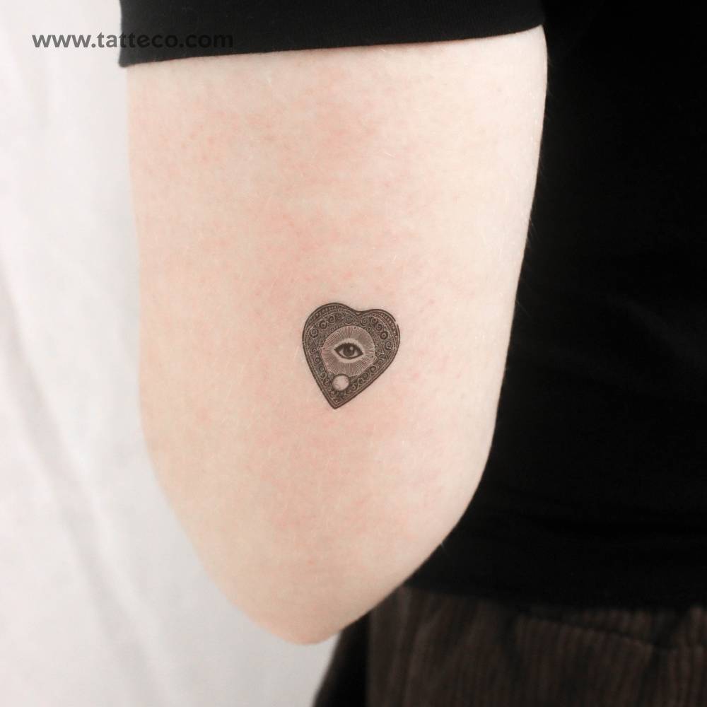 Planchette temporary tattoo located on the tricep.