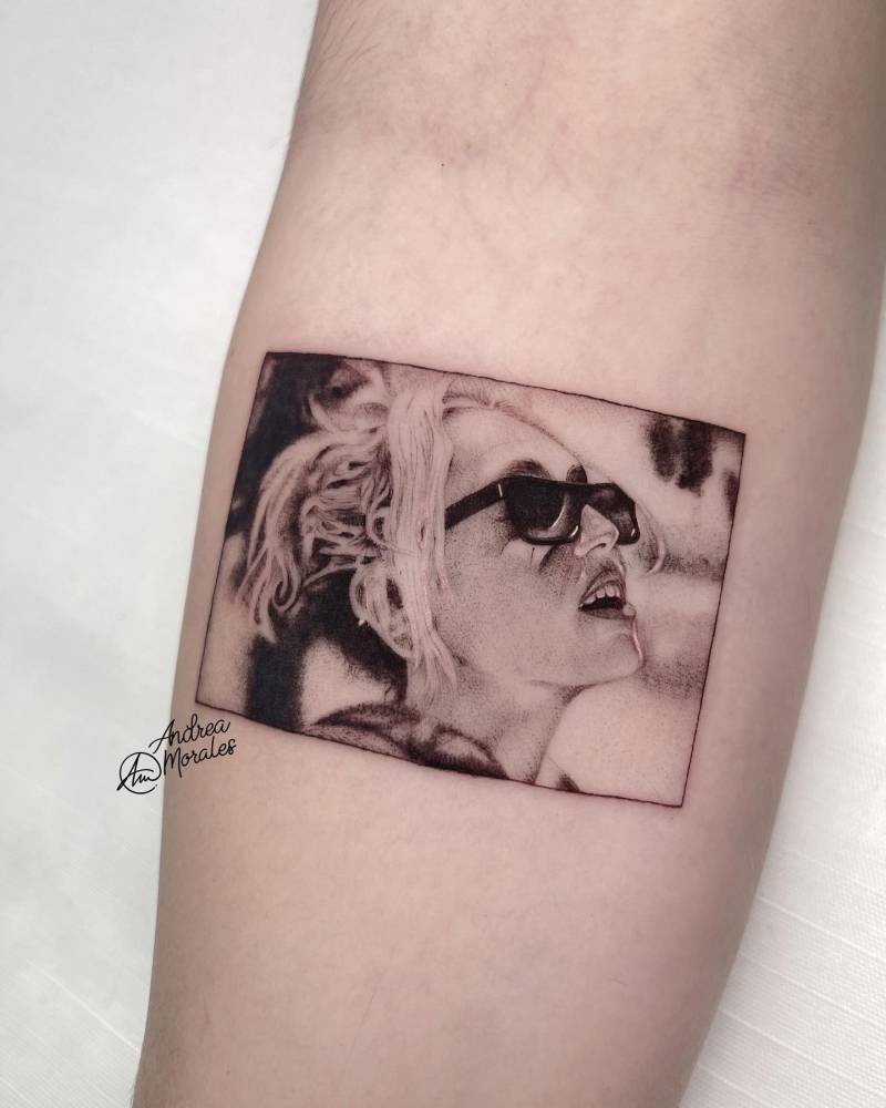 Miley Cyrus portrait tattoo in micro-realistic style done on the inner forearm.