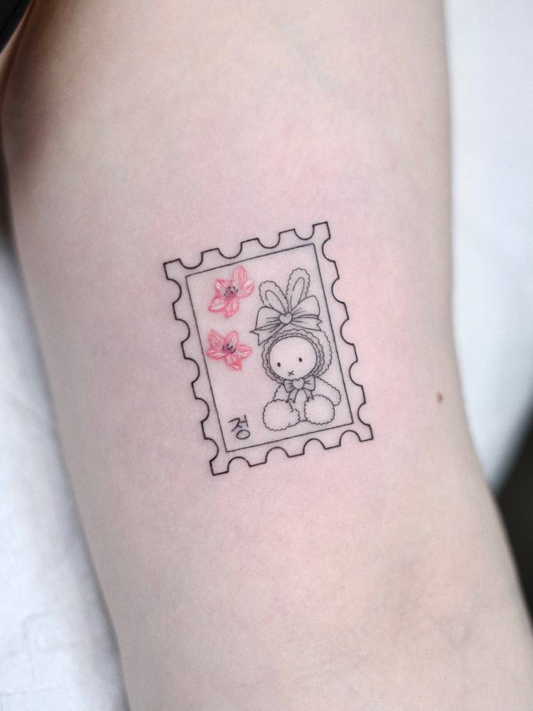 Korean stamp tattoo in fine line style done on the inner arm.