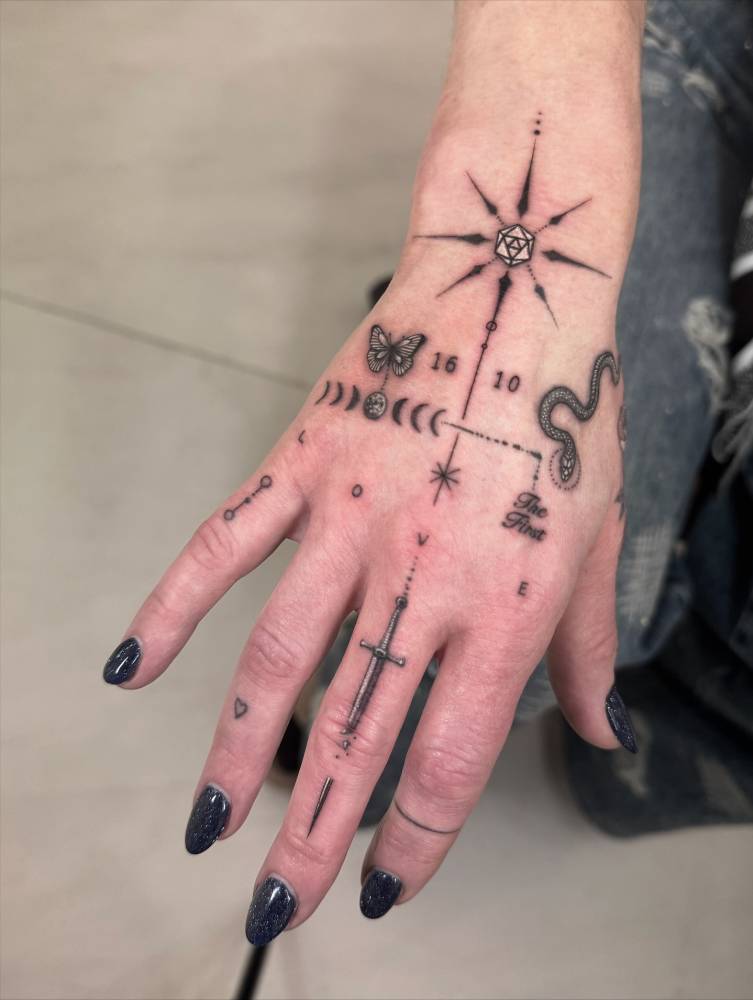 Hand composition tattoos in illustrative style.