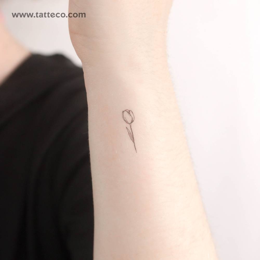 Small fine line tulip temporary tattoo.