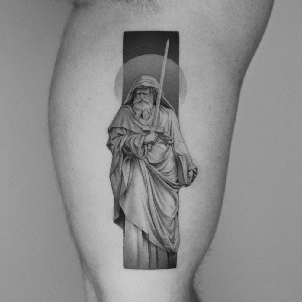 Saint Paul tattoo in classical style located on the inner arm.