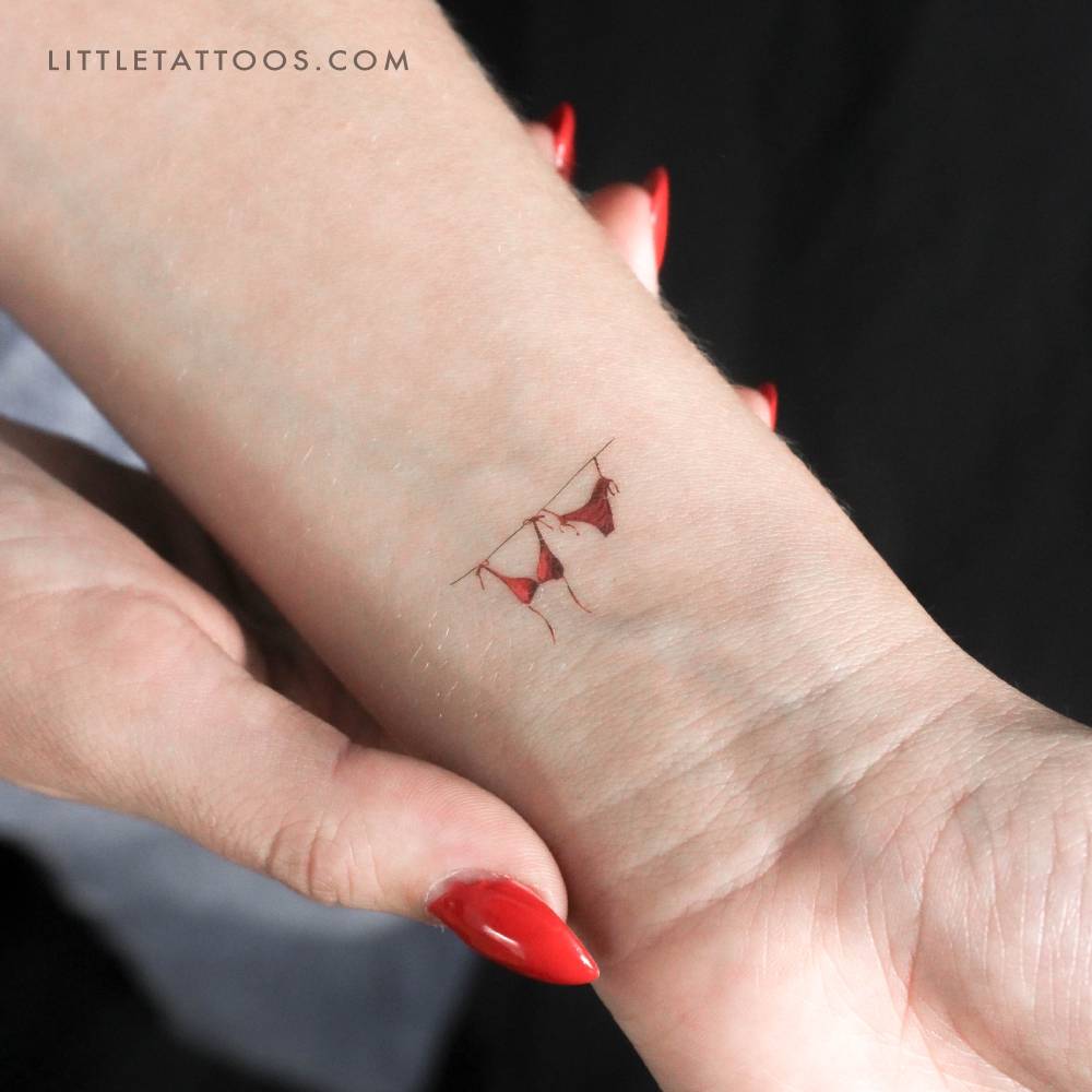 Illustrative style drying bikini temporary tattoo located on the wrist.