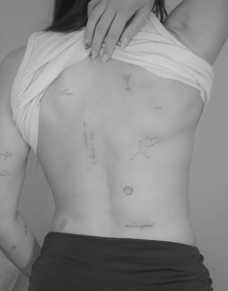 Back composition tattoo collection in fine line style.