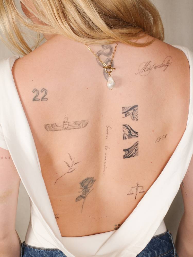 Back composition tattoos.
