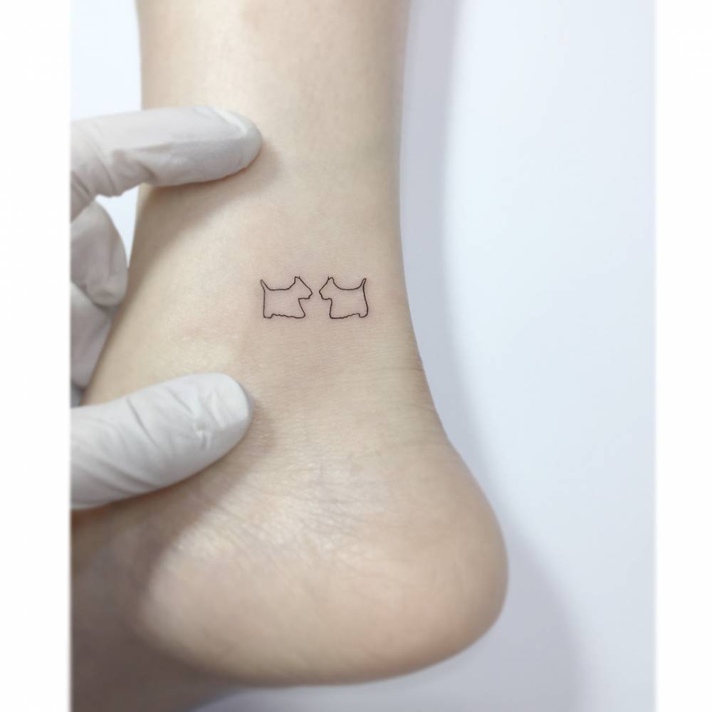 Scottish Terrier tattoo in minimalistic style done on the ankle.