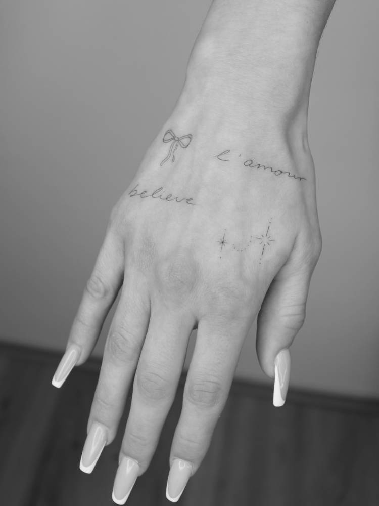 Hand composition tattoos.