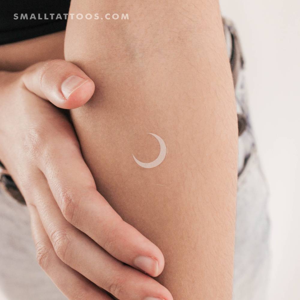 White ink sharp crescent temporary tattoo.
