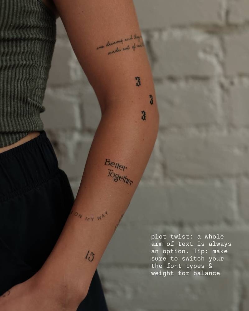 Arm composition lettering tattoos.