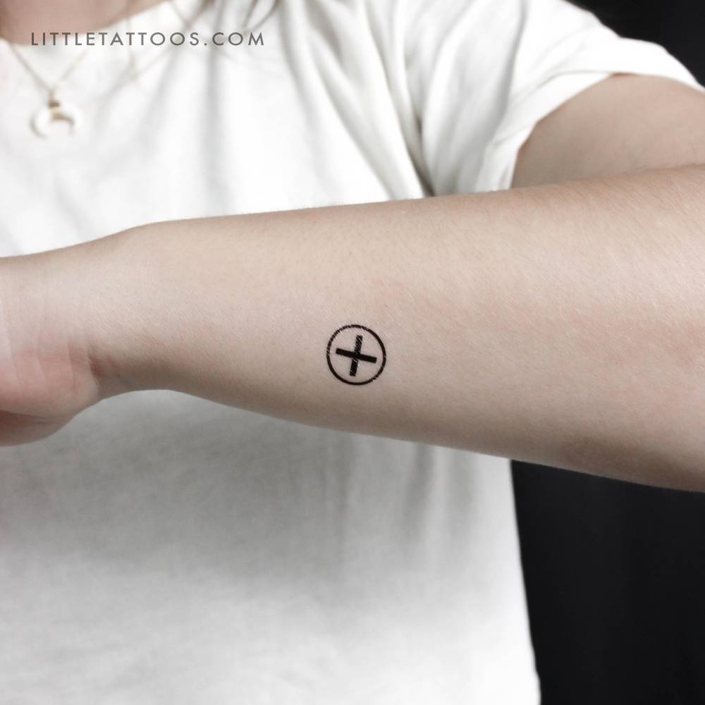 Ailm symbol temporary tattoo located on the wrist.