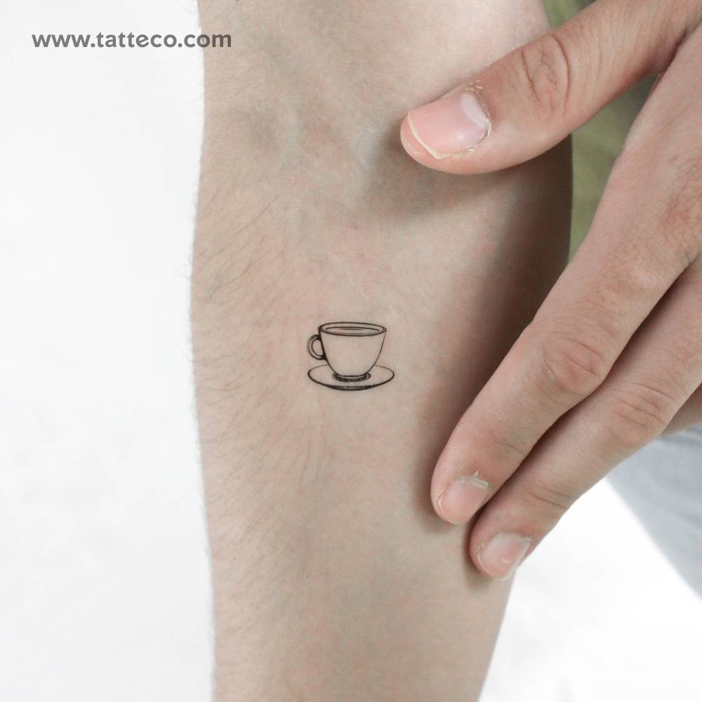 Teacup temporary tattoo located on the inner forearm, fine line style.