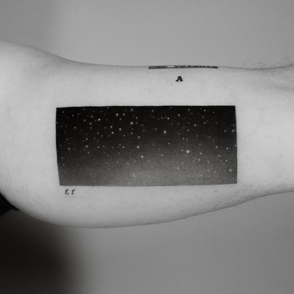 Stars tattoo in micro-realistic style located on the inner arm.