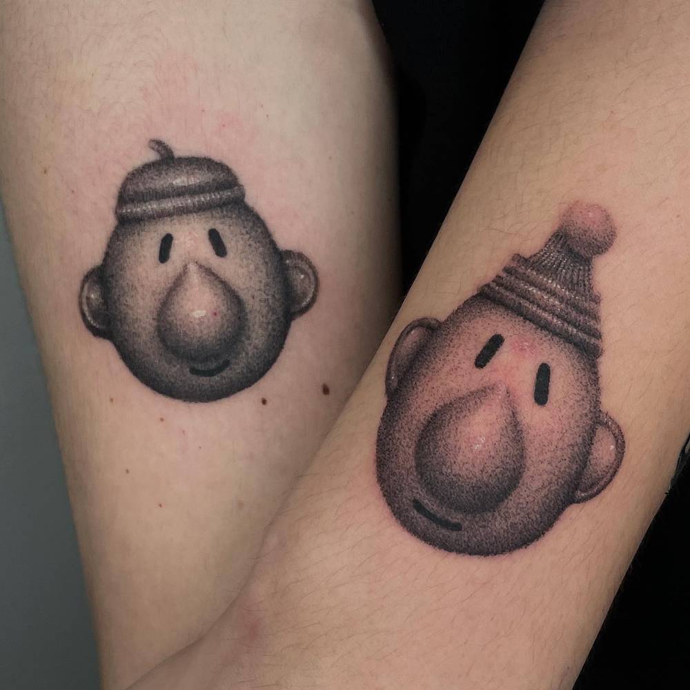 Individual matching Pat & Mat tattoo in dotwork style.