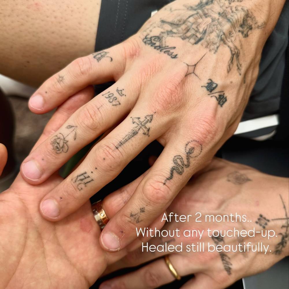 Single needle hand composition tattoos (2 months healed).