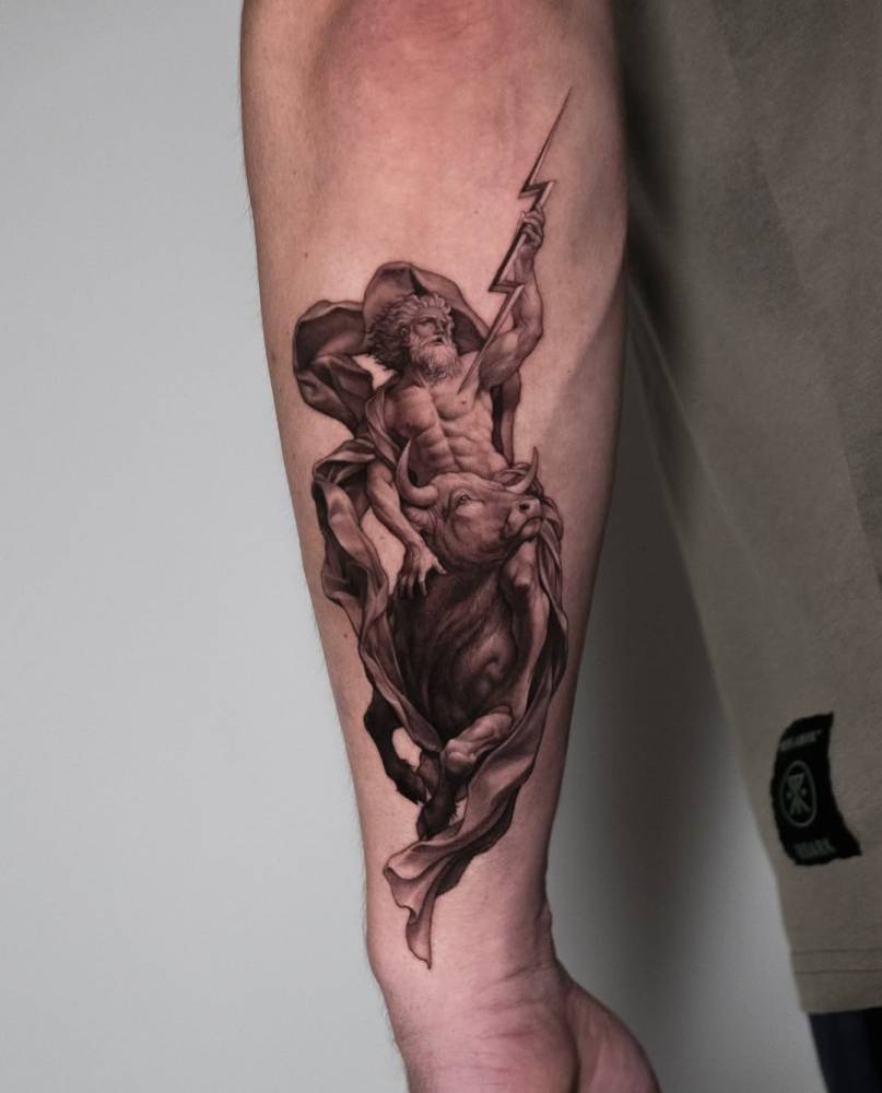 Zeus Turning into a bull tattooed on the forearm.