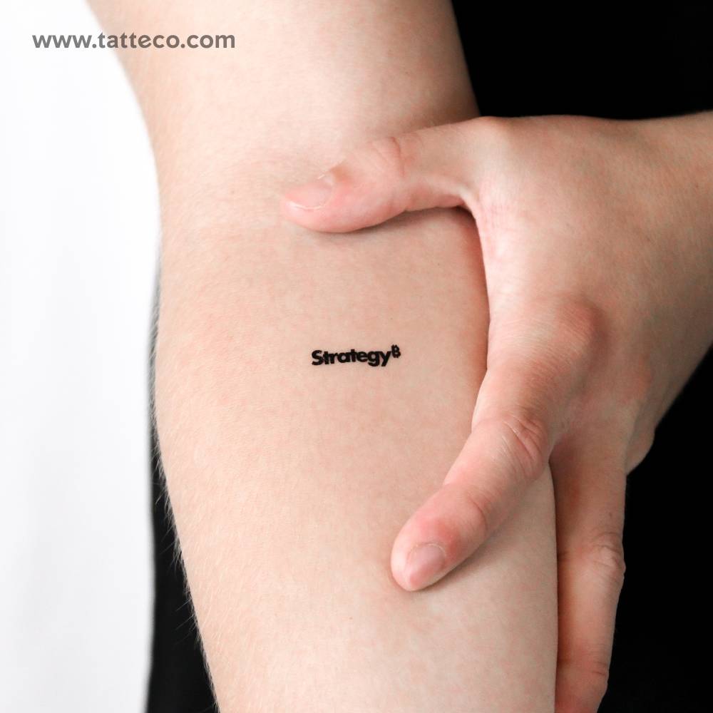 Strategy temporary tattoo located on the inner forearm.
