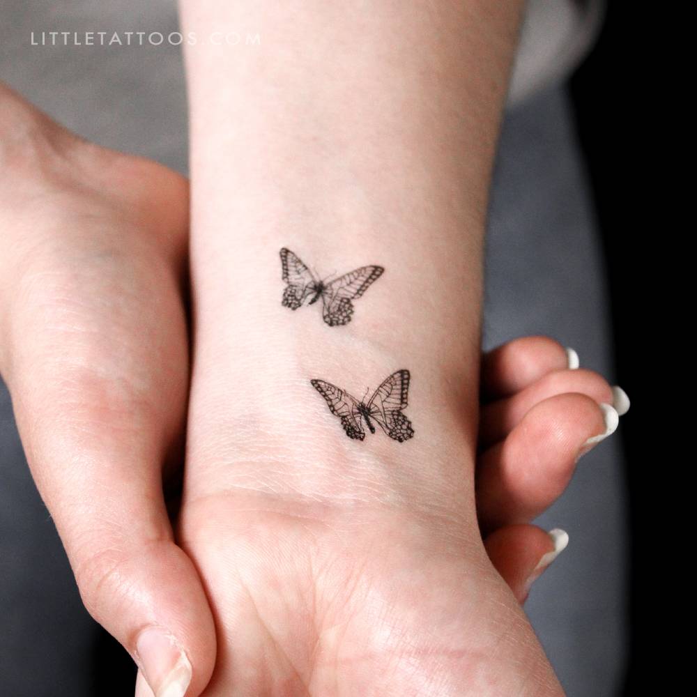 Butterfly lovers temporary tattoo located on the wrist.