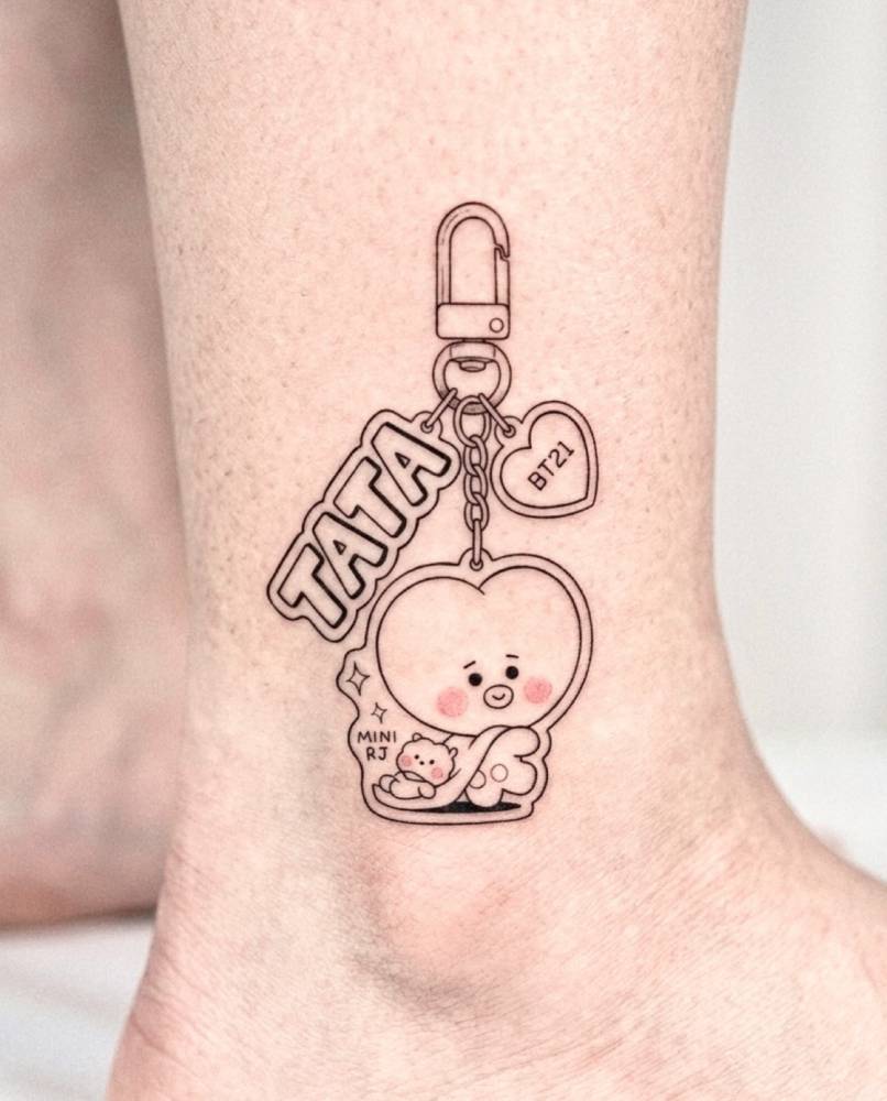 BT21 "Tata" keychain tattoo located on the ankle.