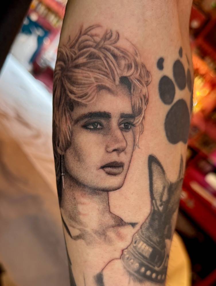 Isabella Rossellini in 'Wild at Heart' tattooed on the inner forearm.
