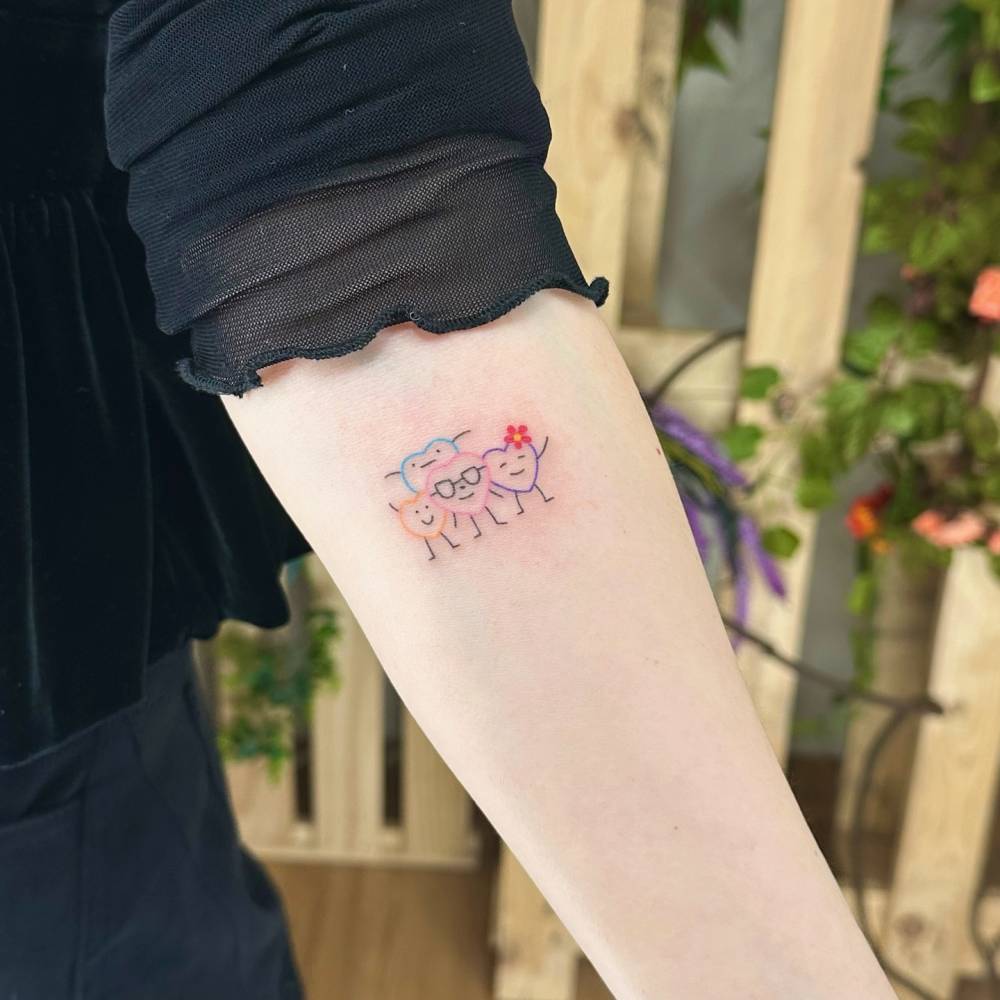 Heart family tattoo in minimalistic style located on the inner forearm.