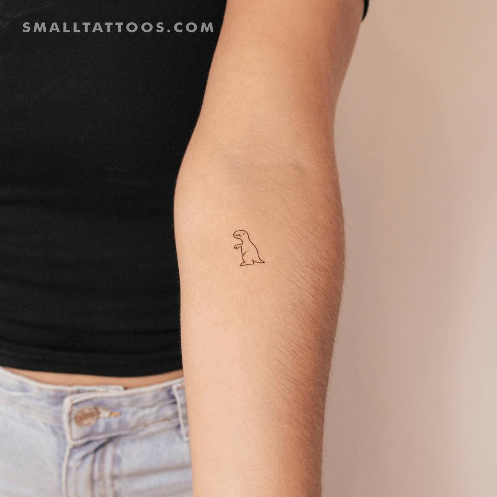 T-Rex dinosaur temporary tattoo located on the inner forearm.