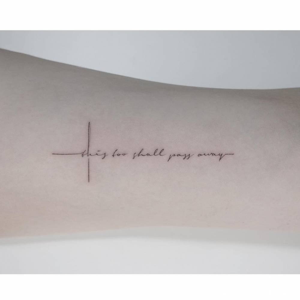 "This too shall pass away" lettering cross tattoo.