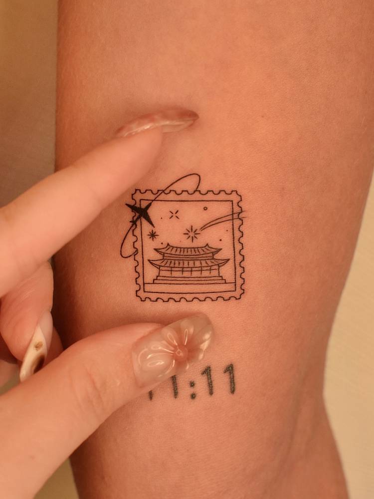 Korean stamp tattoo located on the inner forearm.