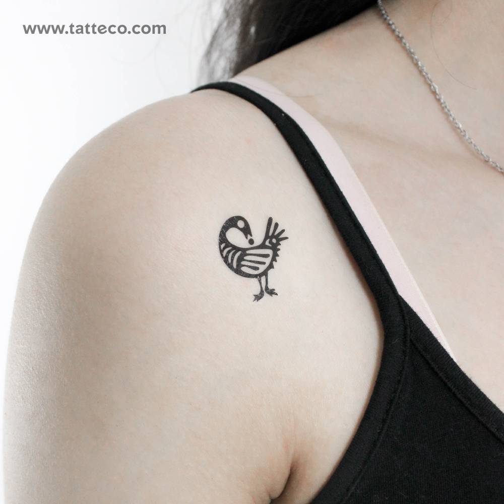 Sankofa bird temporary tattoo located on the shoulder.