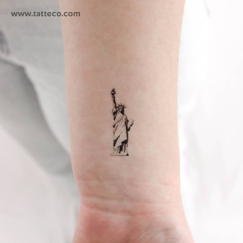 Statue of Liberty temporary tattoo located on the wrist.
