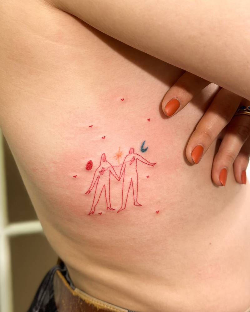 Lovers holding hands tattoo in contemporary style.