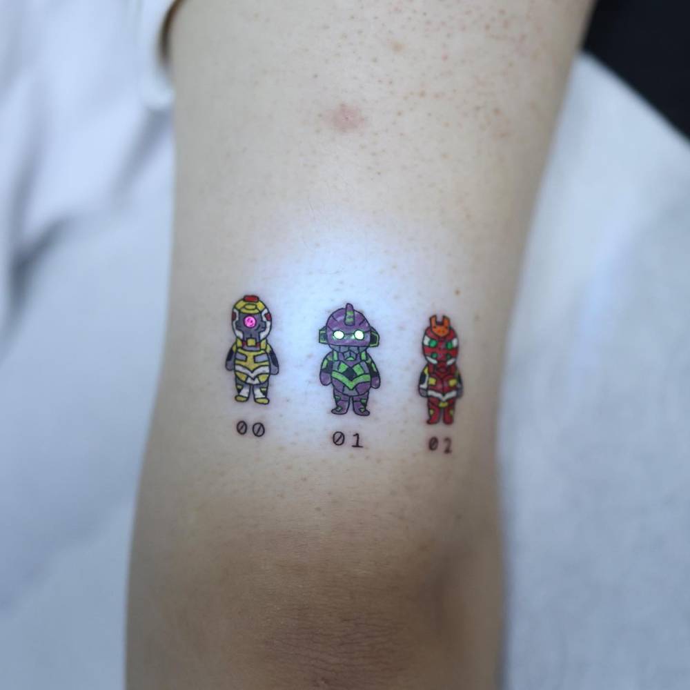 Neon Genesis Evangelion tattoo located on the tricep.