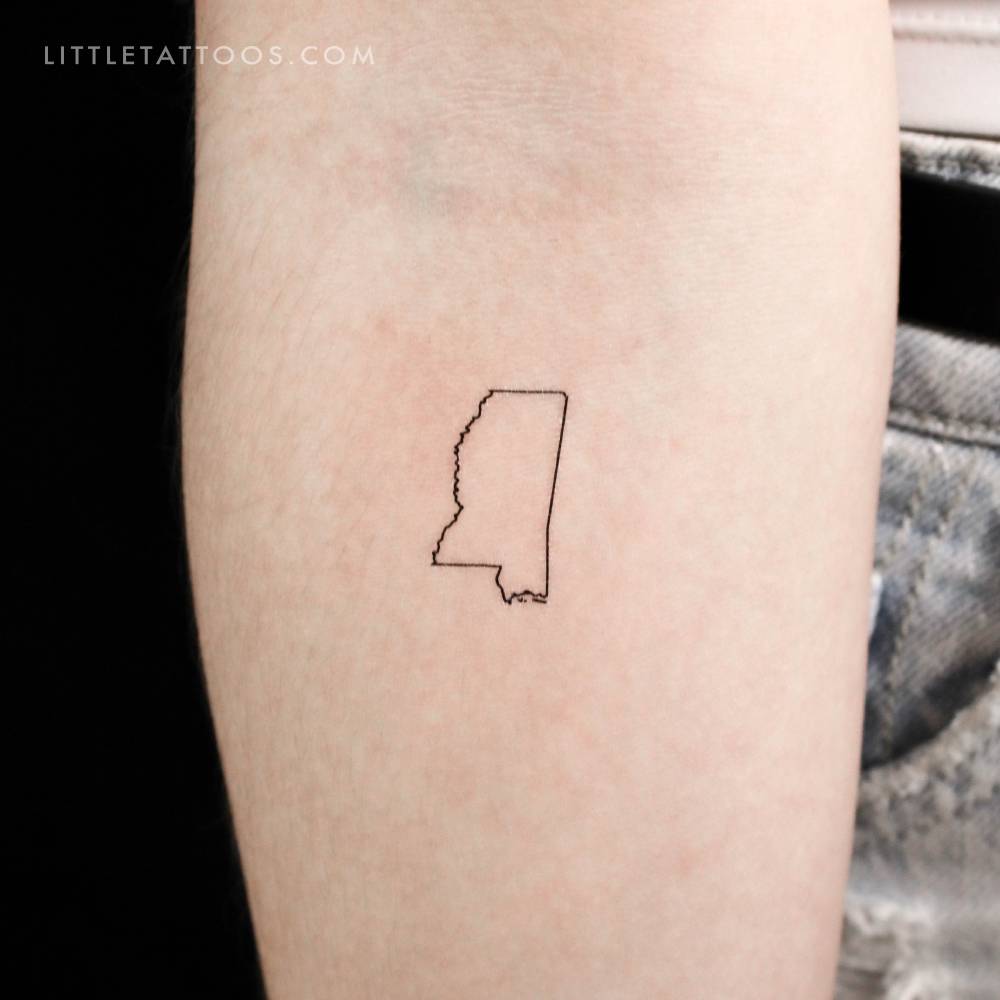 Mississippi map outline temporary tattoo located on the inner forearm.