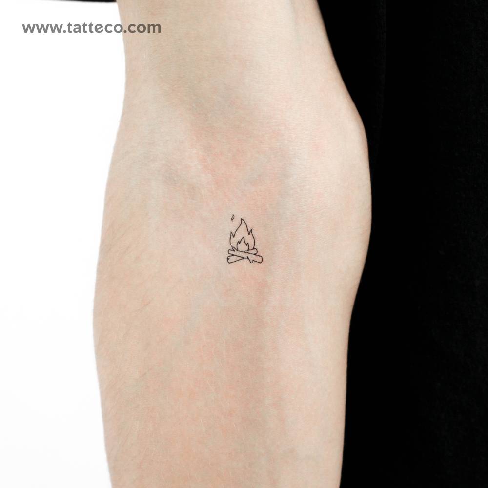 Bonfire temporary tattoo in minimalistic style located on the inner forearm.