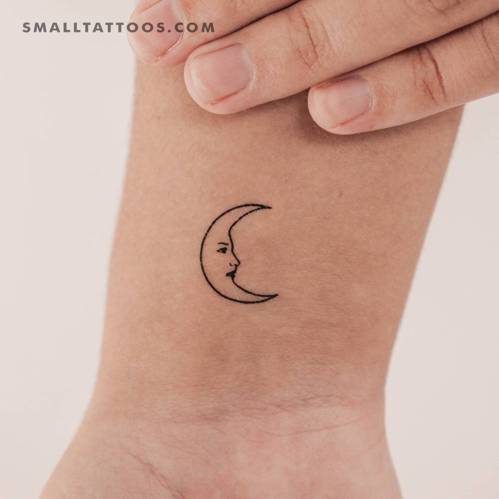 La Luna crescent temporary tattoo located on the wrist.