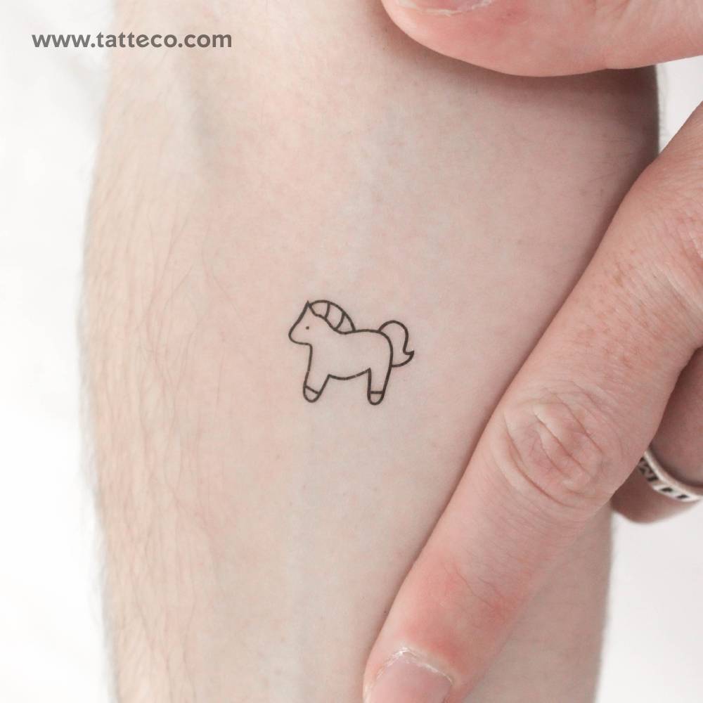 Minimalist horse temporary tattoo located on the inner forearm.