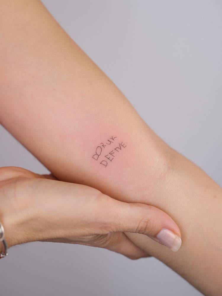 Child's name in their own handwriting.