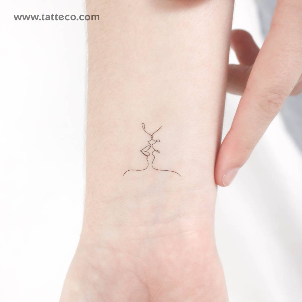 Small kiss by Harmlessberry temporary tattoo.