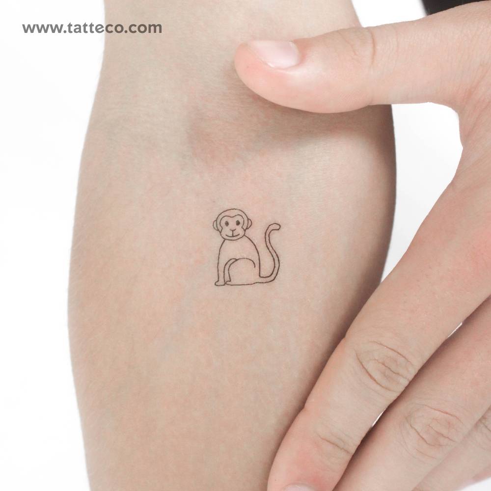 Fine line style little monkey temporary tattoo placed on the inner forearm.
