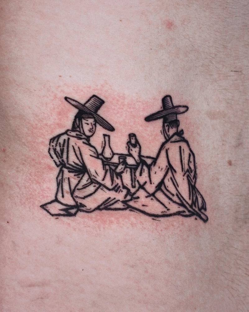 Engraving style Korean scene tattoo located on the back.
